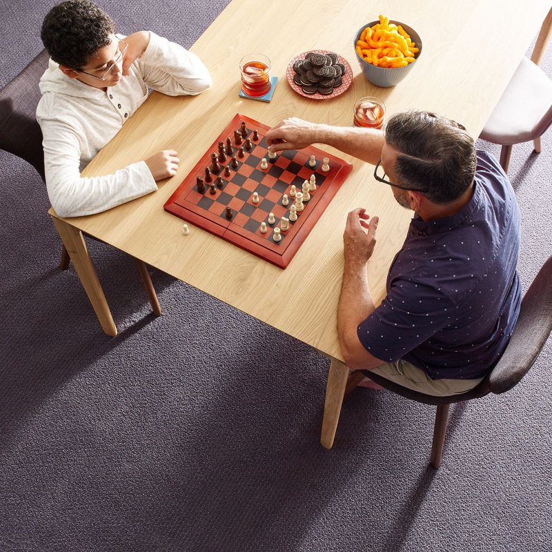 people playing chess from McBride Wayside Carpet Co. in Newington, CT